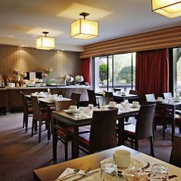 Salle du petit-déjeuner située dans le restaurant Mercure Deauville Hotel du Yacht Club Fotos