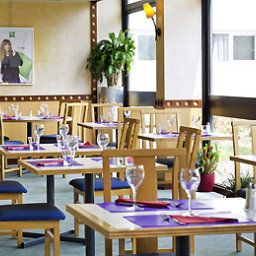 Salle du petit-déjeuner située dans le restaurant Mercure Paris le Bourget (ex ibis Styles) Fotos