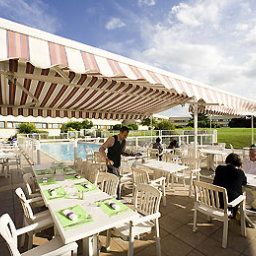 Salle du petit-déjeuner située dans le restaurant Novotel Reims Tinqueux Fotos