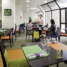 Sala colazione nel ristorante Novotel Le Mans Fotos