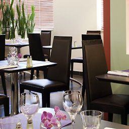 Salle du petit-déjeuner située dans le restaurant Novotel Paris 17 Porte d'Asnières Fotos