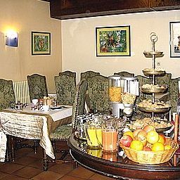 Salle du petit-déjeuner Les Pasteliers Logis Fotos
