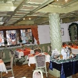 Sala de desayuno en el restaurante Adler Fotos