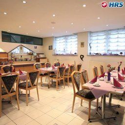 Salle du petit-déjeuner située dans le restaurant Am Wasen Garni Fotos