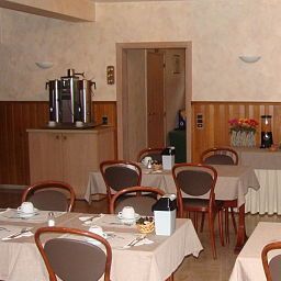 Sala de desayuno en el restaurante Welkom Fotos