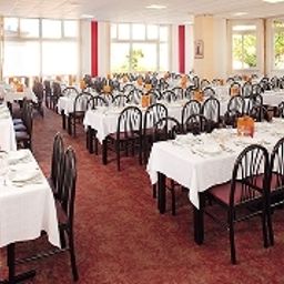 Sala śniadaniowa w restauracji de Lisieux Fotos
