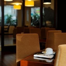 Sala de desayuno en el restaurante Clarion Suites Lisbon Aparthotel Fotos