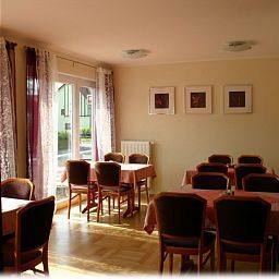 Salle du petit-déjeuner située dans le restaurant Frohmüller Gasthof Fotos