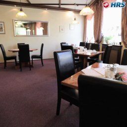 Salle du petit-déjeuner située dans le restaurant Zum Grünen Kranz Fotos