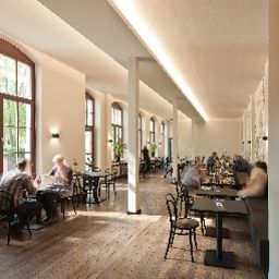 Salle du petit-déjeuner située dans le restaurant Aparthotel und Pension am Zwinger Fotos
