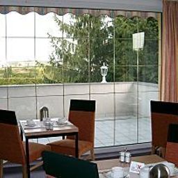 Salle du petit-déjeuner Feldblick Garni Fotos