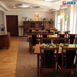 Salle du petit-déjeuner située dans le restaurant Bruy Domicil Fotos