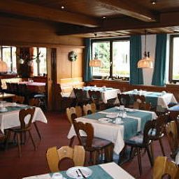 Salle du petit-déjeuner située dans le restaurant Weisses Ross Fotos