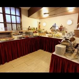 Buffet Astro Aparthotel Fotos