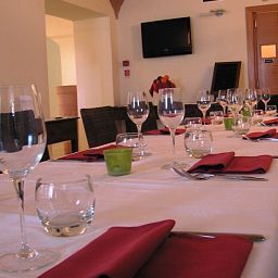Salle du petit-déjeuner située dans le restaurant Casa Mancia Fotos
