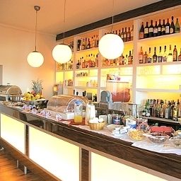 Salle du petit-déjeuner située dans le restaurant City Guesthouse Pension Berlin Fotos