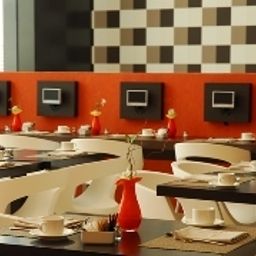 Sala śniadaniowa w restauracji Confortel Aqua 3 Fotos