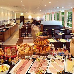 Sala de desayuno Star Inn Fotos