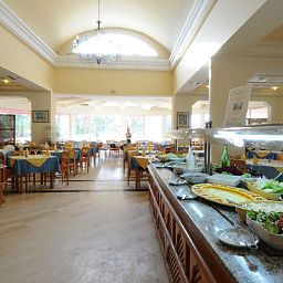 Salle du petit-déjeuner située dans le restaurant Marina Palace Fotos