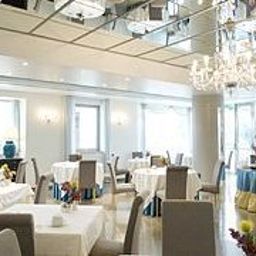 Sala colazione nel ristorante Club House Hotel Fotos