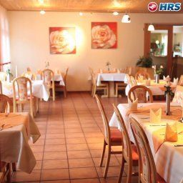 Salle du petit-déjeuner située dans le restaurant Talblick Fotos