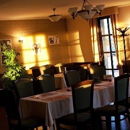 Sala colazione nel ristorante Caramell Fotos