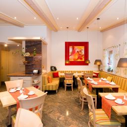 Salle du petit-déjeuner située dans le restaurant Schneider Fotos