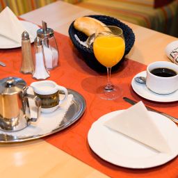 Salle du petit-déjeuner située dans le restaurant Schneider Fotos