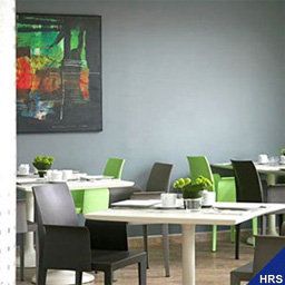 Salle du petit-déjeuner située dans le restaurant Best Western Masqhotel Fotos