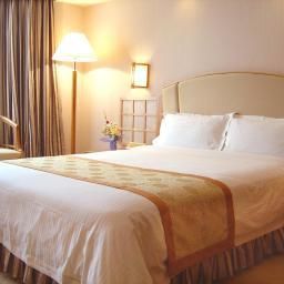 Zimmer Guang Dong Hotel Fotos