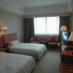 Habitación Media Tourism and Business Hotel Fotos