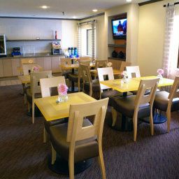 Restaurant La Quinta Inn & Suites Huntsville Madison Square Fotos