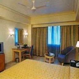Номер Quality Inn Sabari Fotos