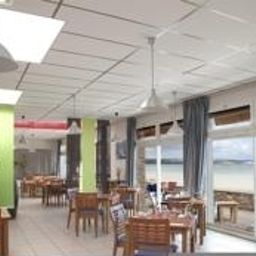 Salle du petit-déjeuner située dans le restaurant Best Western Cap Coz Fotos