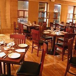 Sala colazione nel ristorante Les Saisons Hôtel Les Saisons Fotos