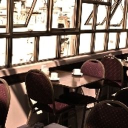 Sala de desayuno America Plaza Fotos