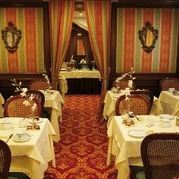 Sala de desayuno en el restaurante Palazzo Sant Angelo Fotos