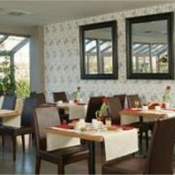 Sala colazione nel ristorante Brugotel Fotos