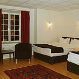 Pokój Norrtull First Hotel Fotos