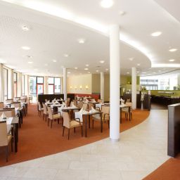 Salle du petit-déjeuner située dans le restaurant Heide Spa Hotel & Resort Fotos