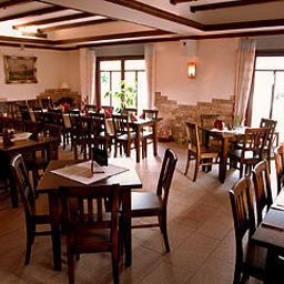 Sala de desayuno en el restaurante Lindenhof Landhotel Fotos