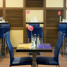 Salle du petit-déjeuner située dans le restaurant Novotel Milano Malpensa Airport Fotos