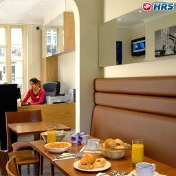 Salle du petit-déjeuner située dans le restaurant Astors Victoria Fotos