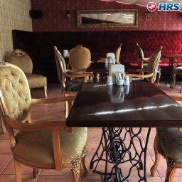 Breakfast room within restaurant Amisos Fotos