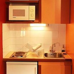 Кухня Sejours & Affaires Strasbourg Kleber Apparthotel Fotos