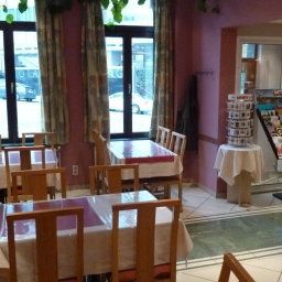 Breakfast room within restaurant Albergo Fotos