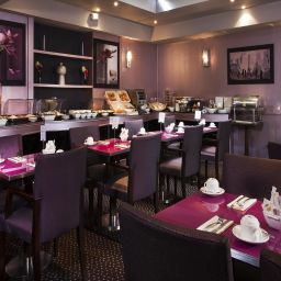 Salle du petit-déjeuner Le Pera Fotos