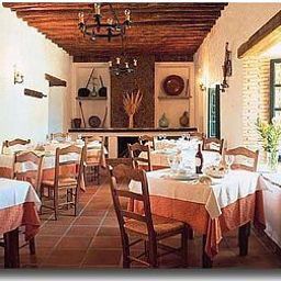 Salle du petit-déjeuner située dans le restaurant El Horcajo Fotos