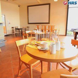 Salle du petit-déjeuner située dans le restaurant Stockwerk Fotos