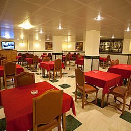 Salle du petit-déjeuner située dans le restaurant Hydra Fotos